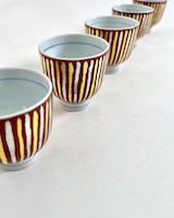 小野次郎 作 「紅地金銀彩煎茶碗」